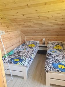 Postel nebo postele na pokoji v ubytování Relax u Agi i Jurka