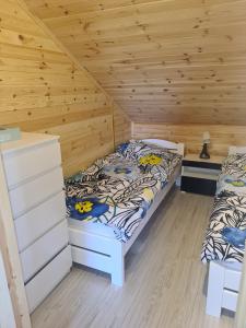 Postel nebo postele na pokoji v ubytování Relax u Agi i Jurka