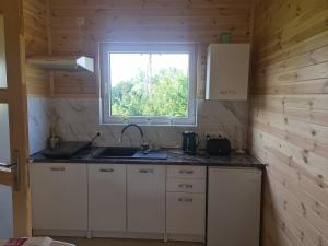 Kuchyň nebo kuchyňský kout v ubytování Relax u Agi i Jurka