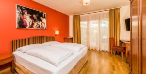 Postel nebo postele na pokoji v ubytování Hotel Traube