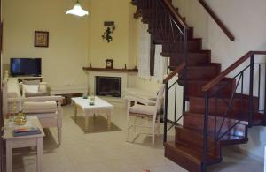 A television and/or entertainment centre at Villa Helidoni