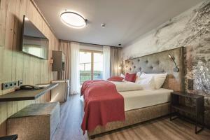 Postel nebo postele na pokoji v ubytování Hotel Astrid - inklusive kostenfreier JokerCard + 37 fotografií