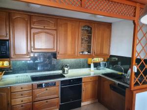 Kuchyňa alebo kuchynka v ubytovaní Nogalera Sea&Sun Apartment