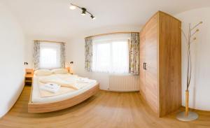 Postel nebo postele na pokoji v ubytování Haus Schwarzenberg