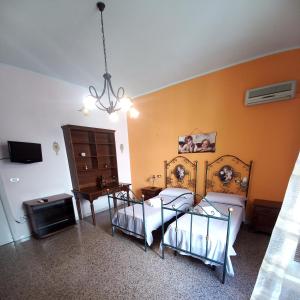 Postel nebo postele na pokoji v ubytování Casa vacanza