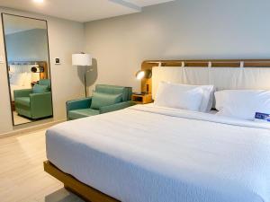 Voodi või voodid majutusasutuse TRYP by Wyndham Mayaguez toas
