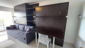 Posezení v ubytování Appartement PIEDS DANS L'EAU VUE MER ACCES PLAGE ET PISCINE + 10 fotografií