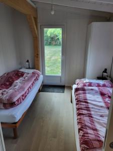 Billede fra billedgalleriet på Rhône Cottage 4, villa, jardin, vélos, balançoires, jeux, 200m étang Vieux Rhône i Noville