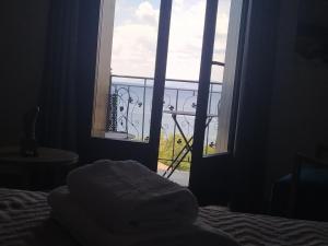 Postel nebo postele na pokoji v ubytování CAPTAINHOUSE