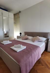 Postel nebo postele na pokoji v ubytování T-star, 2-bedroom apartment with magnificent beach view