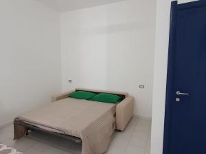 Postel nebo postele na pokoji v ubytování Affittacamere Casa Cynda
