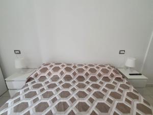 Postel nebo postele na pokoji v ubytování Affittacamere Casa Cynda