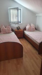 Postel nebo postele na pokoji v ubytování Apartment Julian