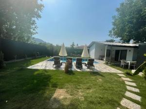 Zahrada ubytování Kaya Koy Tatil Evleri Villas