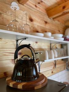 Eldhús eða eldhúskrókur á Log cabins Banjska stena