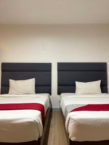 Postel nebo postele na pokoji v ubytování Anex Hotel near US Embassy