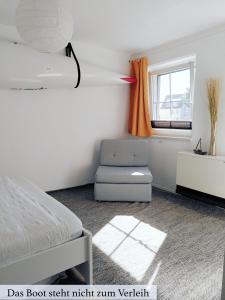 พื้นที่นั่งเล่นของ Usedoms Kleines Ostseeglück #1 in Peenemünde bis 4 Personen, Zuganreise möglich