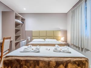 Krevet ili kreveti u jedinici u okviru objekta Alameda Felice Hotel