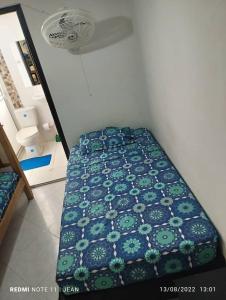 Voodi või voodid majutusasutuse Hermoso Apartamento en Santa Marta toas