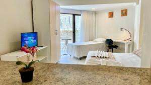 Μια τηλεόραση ή/και κέντρο ψυχαγωγίας στο Marsallis Flat 208 Praia - NBI - Ponta Negra +32 φωτογραφίες