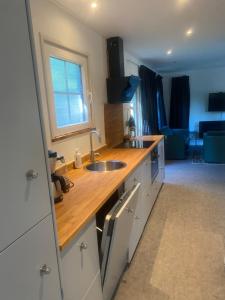 Kuchyň nebo kuchyňský kout v ubytování Wellness chalet met sauna