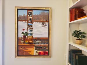 a picture of a kitchen in a frame on a wall at Hearthside Inn in Bar Harbor