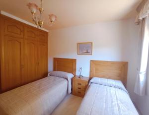 Postel nebo postele na pokoji v ubytování Casa Patrick