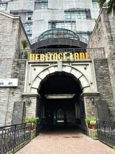 a large entrance to a building with a sign that reads heritage lane at Miza Empire Damansara studio free wifi netflix in Petaling Jaya