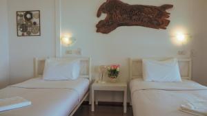 Postel nebo postele na pokoji v ubytování Holiday Resort - SHA Plus