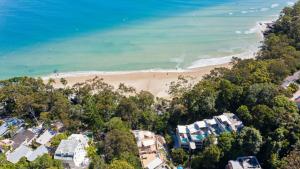 an aerial view of a beach with houses and the ocean at Little Cove Court - Apt 8 in Noosa Heads