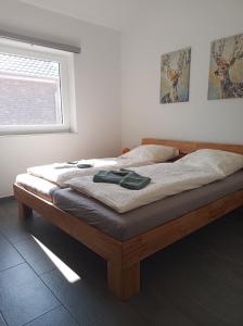 Postel nebo postele na pokoji v ubytování Haus MoorRose
