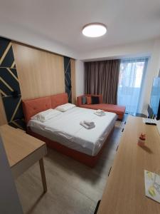 Кровать или кровати в номере Premium - Dragovic apartments
