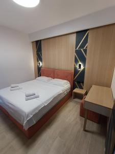 Postel nebo postele na pokoji v ubytování Premium - Dragovic apartments + 18 fotografií