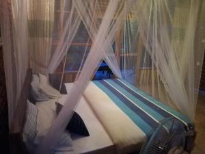 Postel nebo postele na pokoji v ubytování Ayubo Ella - Bed & Breakfast