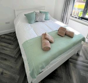 Postel nebo postele na pokoji v ubytování Finner House