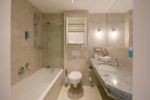 Kúpeľňa v ubytovaní Hotel Sailer