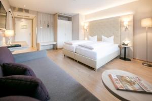 Posteľ alebo postele v izbe v ubytovaní Hotel Sailer