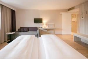 Posteľ alebo postele v izbe v ubytovaní Hotel Sailer