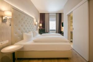 Posteľ alebo postele v izbe v ubytovaní Hotel Sailer