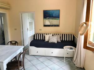 Кровать или кровати в номере Belvedere Residenza Mediterranea