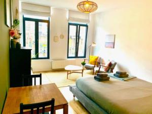 Postel nebo postele na pokoji v ubytování Cozy Apartment in Antwerpen Centraal