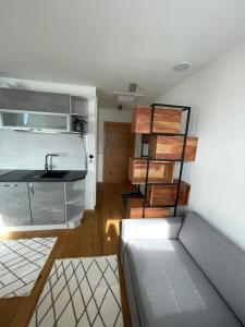 Kuchyň nebo kuchyňský kout v ubytování Mini-Apartment Admont