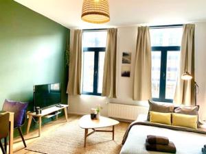 Posezení v ubytování Cozy Apartment in Antwerpen Centraal