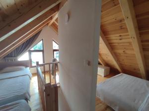 Letto o letti in una camera di Monte Pino Lux Apartments