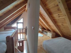 Letto o letti in una camera di Monte Pino Lux Apartments
