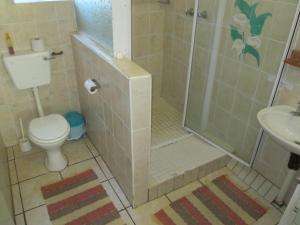 Ванная комната в Bedrock Guesthouse