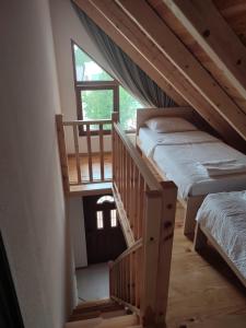 Letto o letti in una camera di Monte Pino Lux Apartments
