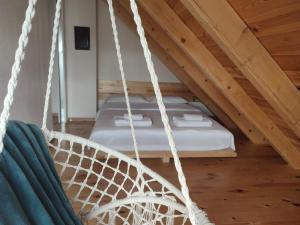 Letto o letti in una camera di Monte Pino Lux Apartments