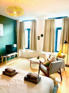 Postel nebo postele na pokoji v ubytování Cozy Apartment in Antwerpen Centraal
