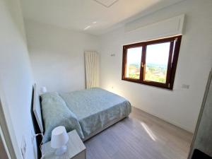 Postel nebo postele na pokoji v ubytování Appartmento incantevole a Sant'Angelo a Scala